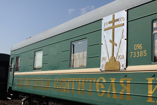Illustration for article titled These Train Cars Converted Into Churches Are Literal Holy Rollers